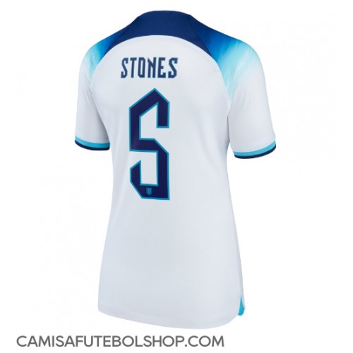 Camisa de time de futebol Inglaterra John Stones #5 Replicas 1º Equipamento Feminina Mundo 2022 Manga Curta